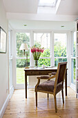 Desk and chair in conservatory extension