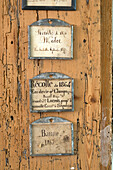 Antique French signs in Arundel home West Sussex England UK