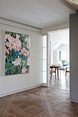 Large art canvas and parquet flooring in Victorian cottage Sussex England UK