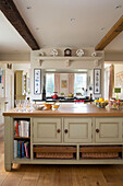 recipe books and basket storage in spacious kitchen of Grade II listed Georgian country house in Shropshire England UK