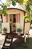 View into traditional gypsy caravan used as a playhouse Sussex UK