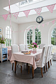 Dining room extension with three arched windows in Georgian West Sussex rectory UK