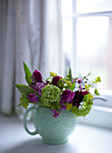 Vintage Blooms - Vase of cut flowers on a window sill