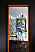 Easter Table setting through doorway with spring flowers