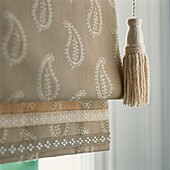 Window treatment patterned roman blind and blind pull neutral colours