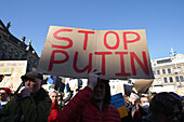 Demonstrators protesting the Russian invasion of Ukraine