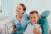 Happy young boy in dental surgery
