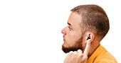 Man using hearing aid