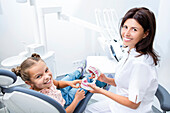 Young girl and dentist