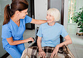 Nurse caring for senior woman