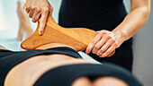 Anti-cellulite maderotherapy thigh treatment
