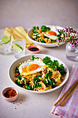 Kale kimchi with fried rice and broken yolk