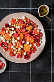 Blood orange salad with mini mozzarella and raspberries