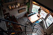 View from above of rustic kitchen with dining area