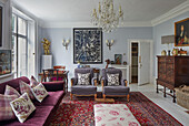 Elegant lounge with upholstered furniture and antiques