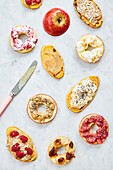 Children's snacks: Bagels and sweet potato slices spread with different toppings