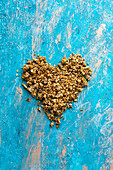 Granola heart on a blue background