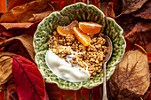 Granola with natural yoghurt and clementines