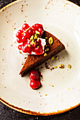 Flourless chocolate cake with red currants