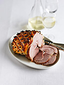 Larded roast ham, sliced