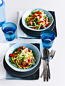 Asian noodles with pork meatballs and vegetables