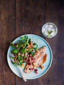 Pan-fried trout with bacon, almonds and beetroot