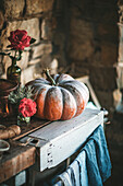 Large pumpkin on a rustic wooden cabinet