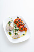 Grilled monkfish with cherry tomatoes