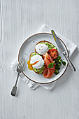 Avocado on taost with a poached egg and smoked salmon