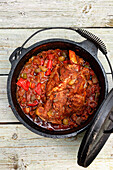 Braised lamb shoulder with vegetables in the Dutch Oven