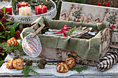 Nostalgic box with cutlery and Christmas decoration