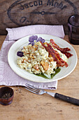 Quince risotto with bacon on a rustic plate
