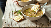 Onion soup with Camembert bread croutons