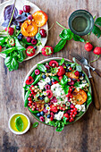 Berry burrata salad with basil and fried apricots