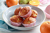 Orange-flavored muffins with pear slices