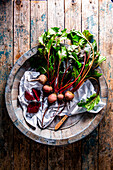 Fresh beets in a wooden bowl