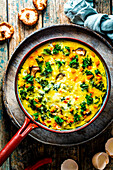 Winter vegetable omelet with kale and shiitake mushrooms