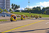 Coco-taxis in Revolution Plaza, Havana