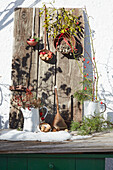 Winter decoration with twigs, berries and nuts