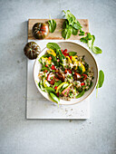 Quinoa salad with peppers, courgettes and tomatoes