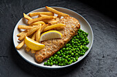 Fish and chips with peas