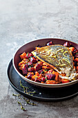 Spiced beetroot and sweet potato hash with crispy skinned angelfish