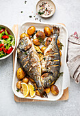 Grilled gilt-head seabream with potatoes