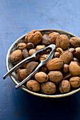 Bowl of nuts and nut crackers