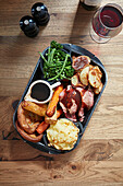 A tradtional Sunday Roast: Beef, yorksire puddings, vegetables and mac and cheese