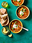 Spiced bean and squash soup with yoghurt and coriander