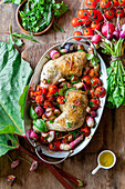 Chicken roasted with rhubarb, tomatoes and radishes
