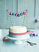 Christmas cake with bauble bunting