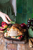 Roasted pork with apples and rosemary