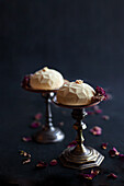 Single servings of cake with dried rose petals